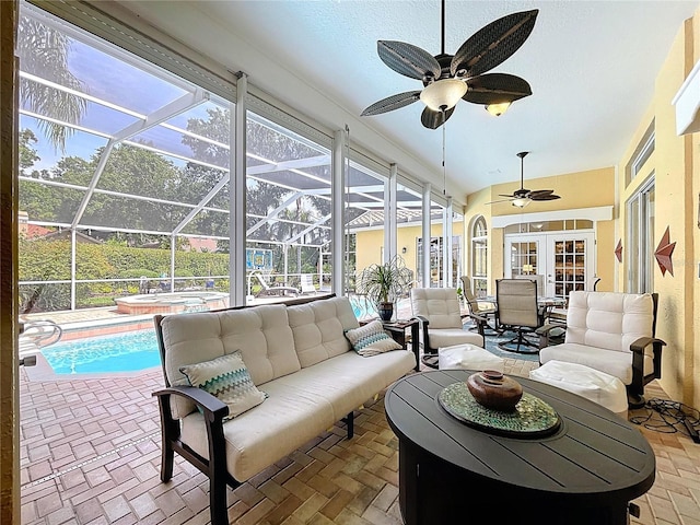 1358 Forestedge Blvd, Oldsmar, FL 34677 - sunroom / solarium with french doors, ceiling fan, an outdoor hangout area, a jacuzzi, and vaulted ceiling