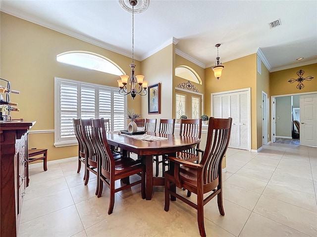 1358 Forestedge Blvd, Oldsmar, FL 34677 - dining room featuring ornamental molding, light tile patterned floors, a chandelier, and a towering ceiling