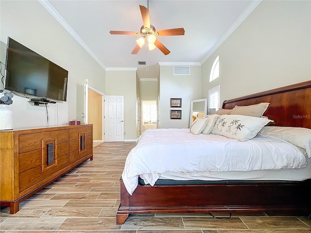 1358 Forestedge Blvd, Oldsmar, FL 34677 - bedroom with wood finish floors, crown molding, and a ceiling fan