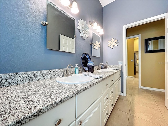 1358 Forestedge Blvd, Oldsmar, FL 34677 - bathroom with double vanity and tile patterned flooring