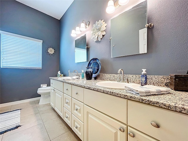 1358 Forestedge Blvd, Oldsmar, FL 34677 - full bathroom featuring double vanity, tile patterned flooring, and healthy amount of natural light