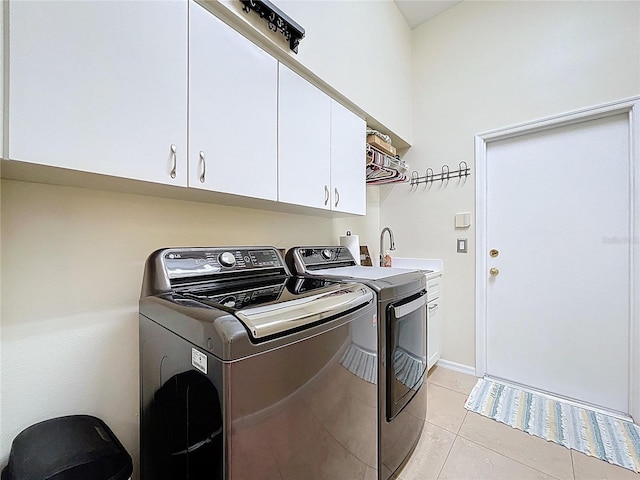 1358 Forestedge Blvd, Oldsmar, FL 34677 - washroom with washing machine and dryer, cabinet space, and light tile patterned floors