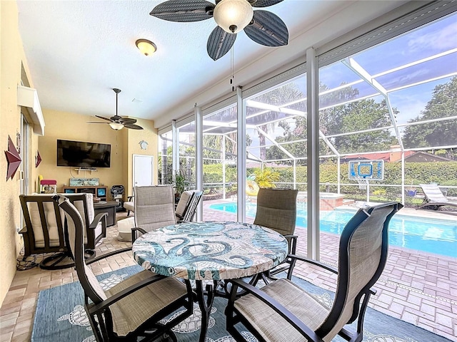 1358 Forestedge Blvd, Oldsmar, FL 34677 - sunroom / solarium with ceiling fan and a pool