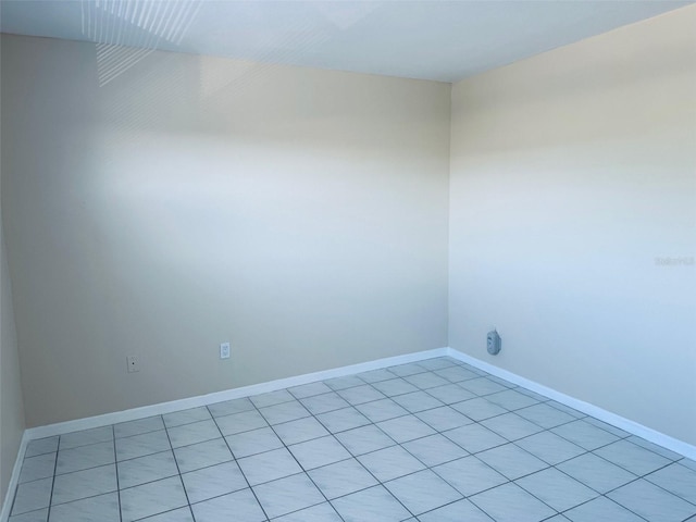2525 W Bay Dr Unit A33, Largo, FL 33770 - spare room featuring baseboards