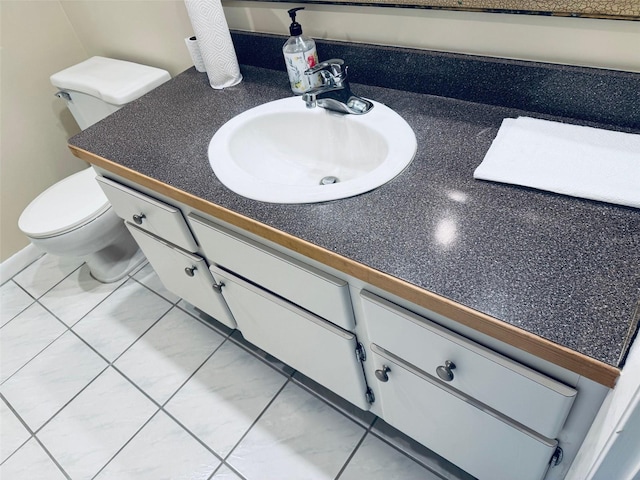 2525 W Bay Dr Unit A33, Largo, FL 33770 - bathroom featuring vanity and tile patterned flooring
