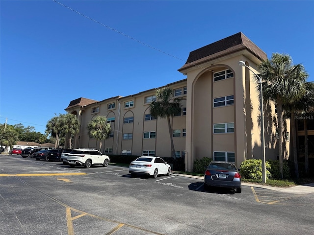 2525 W Bay Dr Unit A33, Largo, FL 33770 - view of property with uncovered parking