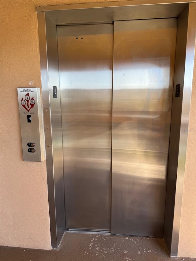 2525 W Bay Dr Unit A33, Largo, FL 33770 - elevator featuring concrete flooring