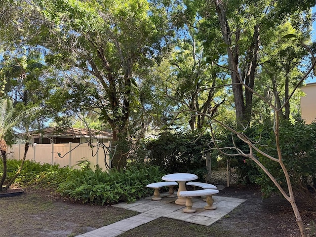 2525 W Bay Dr Unit A33, Largo, FL 33770 - view of yard with a patio area