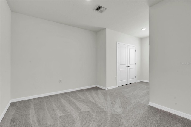 33036 Frosted Clover Way, Wesley Chapel, FL 33545 - carpeted spare room featuring baseboards and recessed lighting