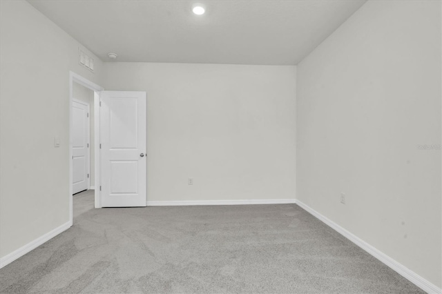 33036 Frosted Clover Way, Wesley Chapel, FL 33545 - carpeted spare room featuring recessed lighting and a smoke detector