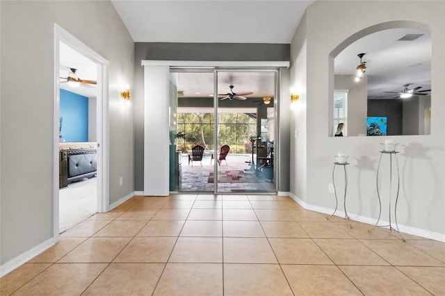 317 Royal Bonnet Dr, Apollo Beach, FL 33572 - tiled foyer featuring a ceiling fan and arched walkways