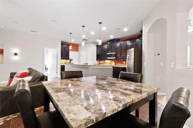 317 Royal Bonnet Dr, Apollo Beach, FL 33572 - tiled dining space with recessed lighting and baseboards