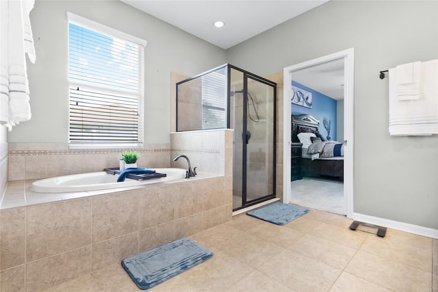 317 Royal Bonnet Dr, Apollo Beach, FL 33572 - full bathroom featuring tile patterned floors, a garden tub, connected bathroom, and a shower stall