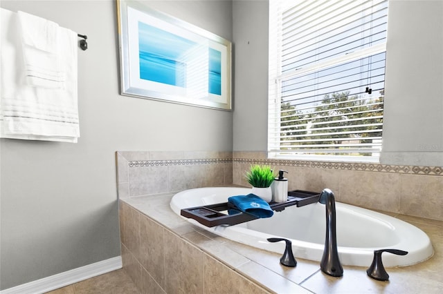317 Royal Bonnet Dr, Apollo Beach, FL 33572 - bathroom featuring a bath and baseboards