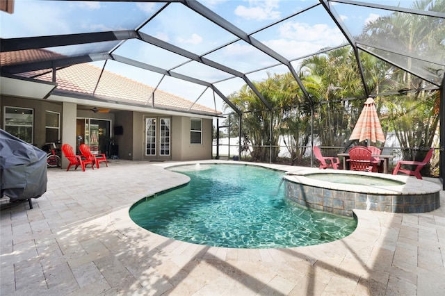 317 Royal Bonnet Dr, Apollo Beach, FL 33572 - view of swimming pool with a pool with connected hot tub, ceiling fan, a patio, and a lanai