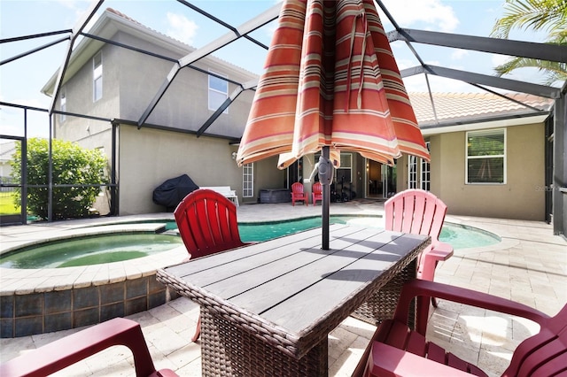 317 Royal Bonnet Dr, Apollo Beach, FL 33572 - view of pool with a patio area, a lanai, a pool with connected hot tub, and outdoor dining space