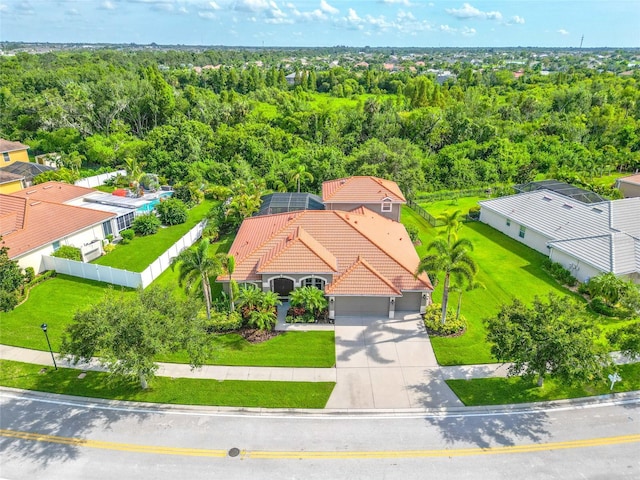 317 Royal Bonnet Dr, Apollo Beach, FL 33572 - aerial view of property and surrounding area featuring a heavily wooded area
