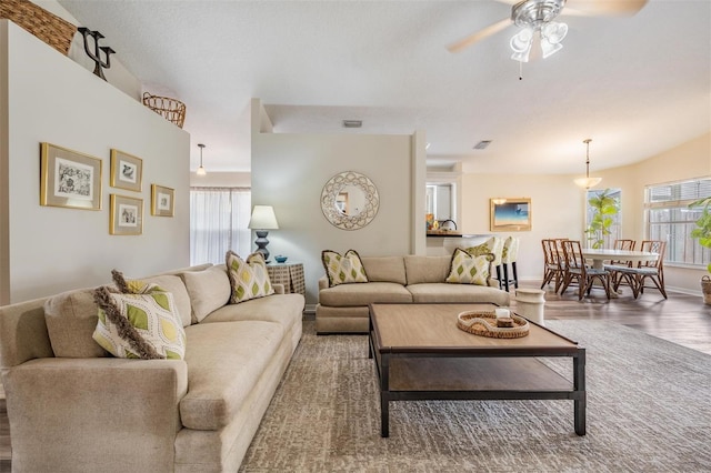 2208 Cattleman Dr, Brandon, FL 33511 - living room with plenty of natural light, a ceiling fan, and wood finished floors