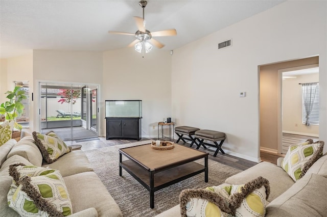2208 Cattleman Dr, Brandon, FL 33511 - living area featuring wood finished floors, ceiling fan, and high vaulted ceiling
