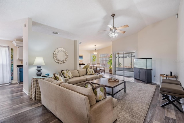 2208 Cattleman Dr, Brandon, FL 33511 - living room with a ceiling fan, wood finished floors, and vaulted ceiling