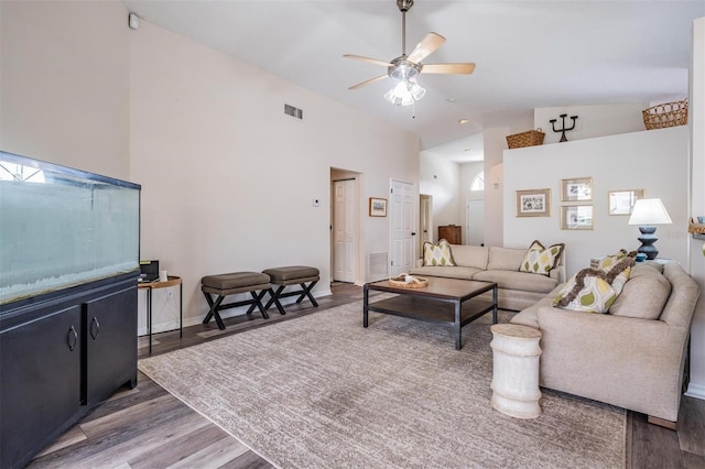 2208 Cattleman Dr, Brandon, FL 33511 - living room featuring high vaulted ceiling, wood finished floors, and a ceiling fan