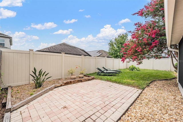 2208 Cattleman Dr, Brandon, FL 33511 - fenced backyard with a patio area