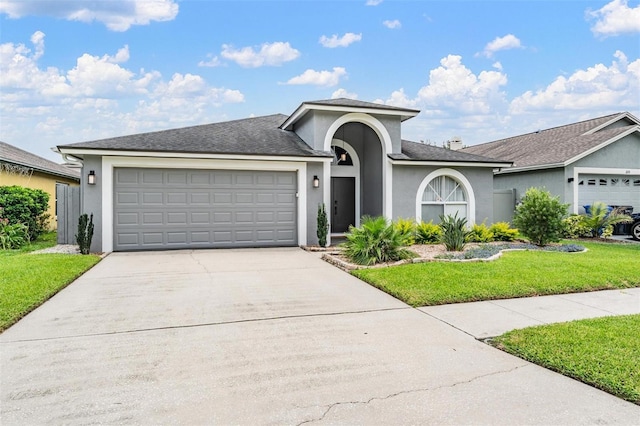 2208 Cattleman Dr, Brandon, FL 33511 - ranch-style home with stucco siding, driveway, a garage, and a front lawn