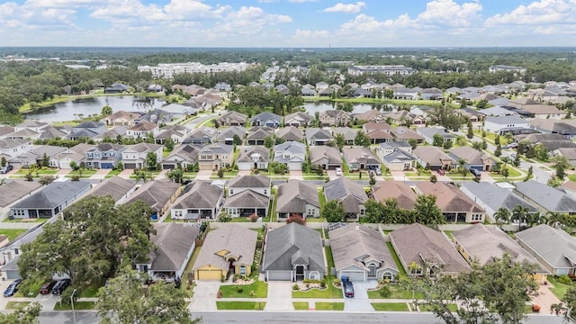 2208 Cattleman Dr, Brandon, FL 33511 - aerial view of residential area featuring a nearby body of water