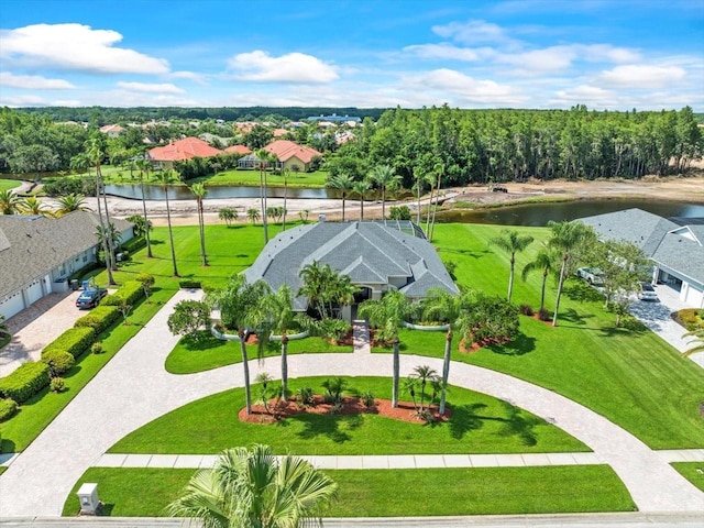 4521 Cheval Blvd, Lutz, FL 33558 - view of home's community featuring a water view, a residential view, and curved driveway