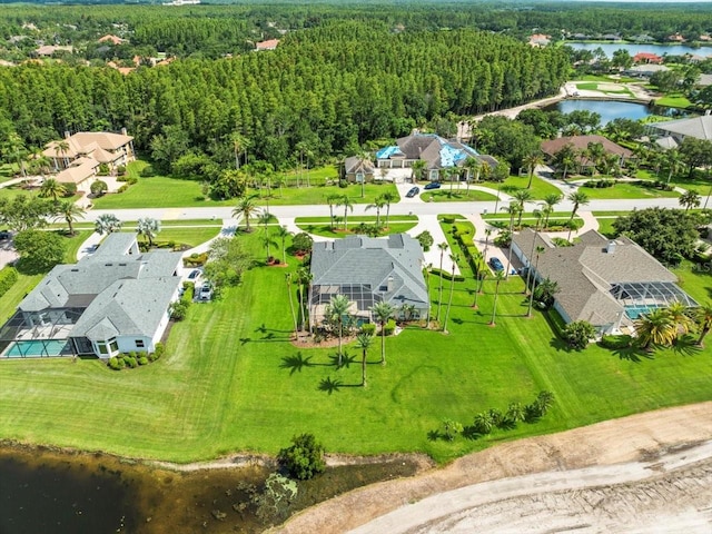 4521 Cheval Blvd, Lutz, FL 33558 - aerial perspective of suburban area featuring a large body of water and a heavily wooded area