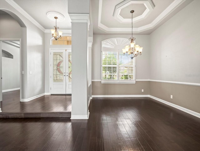 4521 Cheval Blvd, Lutz, FL 33558 - entryway featuring a chandelier, hardwood / wood-style floors, arched walkways, and ornamental molding