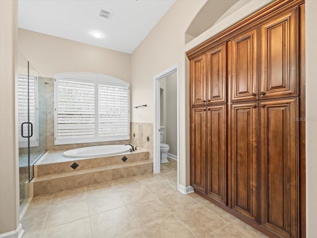 4521 Cheval Blvd, Lutz, FL 33558 - full bathroom featuring a garden tub, tile patterned floors, and a stall shower