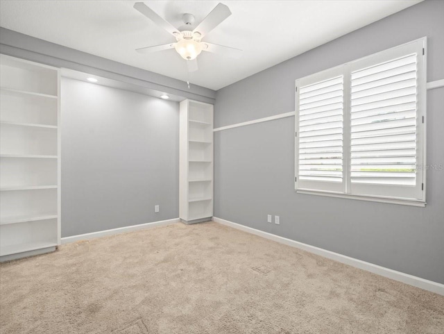 4521 Cheval Blvd, Lutz, FL 33558 - spare room with ceiling fan and carpet flooring