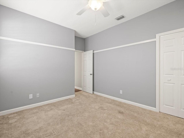 4521 Cheval Blvd, Lutz, FL 33558 - empty room featuring carpet flooring and a ceiling fan