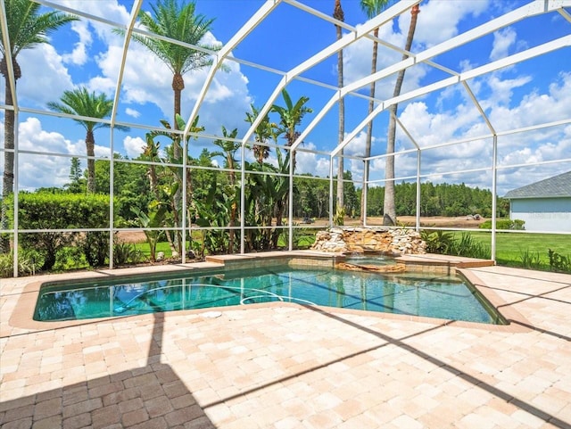 4521 Cheval Blvd, Lutz, FL 33558 - view of pool featuring a patio, a lanai, and a pool with connected hot tub