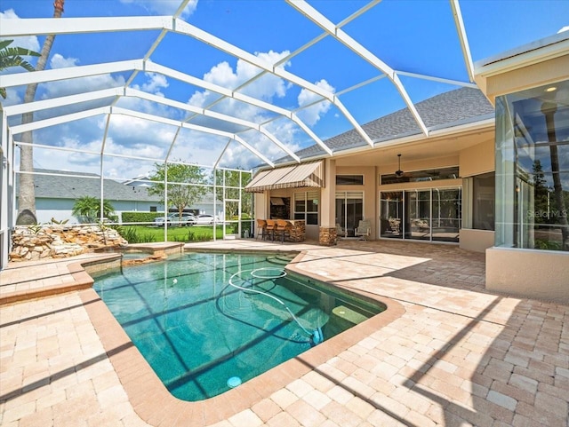4521 Cheval Blvd, Lutz, FL 33558 - view of pool featuring a patio area, ceiling fan, a pool with connected hot tub, and a lanai