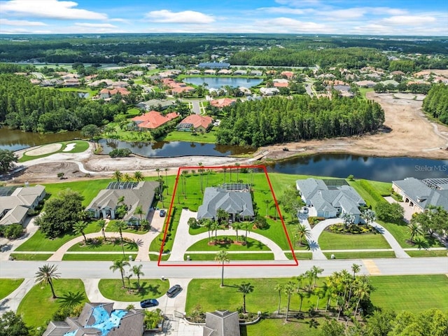 4521 Cheval Blvd, Lutz, FL 33558 - aerial view of residential area with property parcel outlined and a large body of water