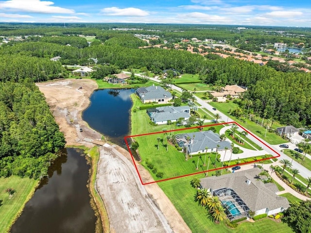 4521 Cheval Blvd, Lutz, FL 33558 - aerial view of residential area featuring a large body of water and property parcel outlined