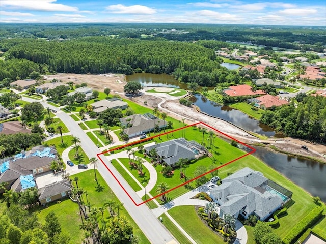 4521 Cheval Blvd, Lutz, FL 33558 - aerial view of residential area featuring property parcel outlined and a large body of water