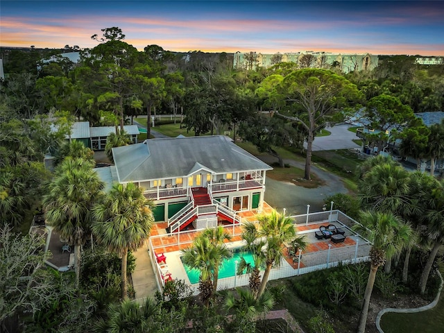 4915 S Rd, New Port Richey, FL 34652 - aerial view at dusk of view of pool area