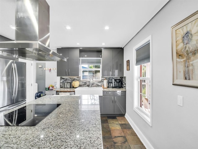 4915 S Rd, New Port Richey, FL 34652 - kitchen featuring island range hood, black electric cooktop, freestanding refrigerator, gray cabinetry, and recessed lighting