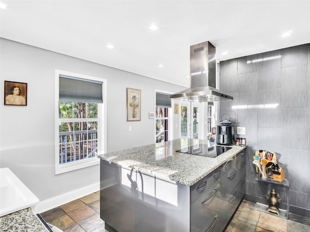 4915 S Rd, New Port Richey, FL 34652 - kitchen featuring island exhaust hood, black electric stovetop, gray cabinetry, a peninsula, and modern cabinets