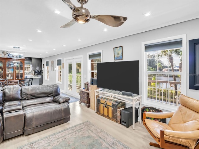 4915 S Rd, New Port Richey, FL 34652 - living area with plenty of natural light, ceiling fan, recessed lighting, light wood-style floors, and french doors