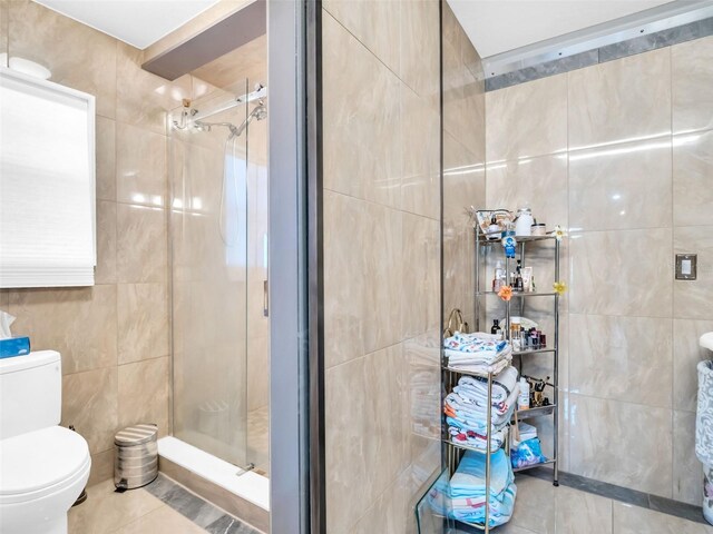 4915 S Rd, New Port Richey, FL 34652 - full bathroom featuring tile walls and a shower stall