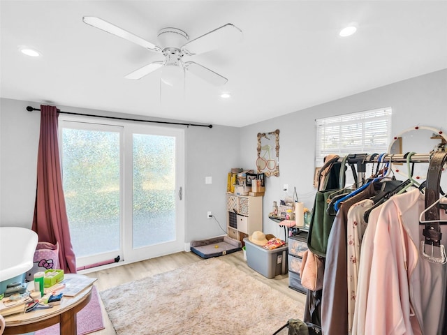 4915 S Rd, New Port Richey, FL 34652 - spacious closet featuring light wood-style flooring and a ceiling fan