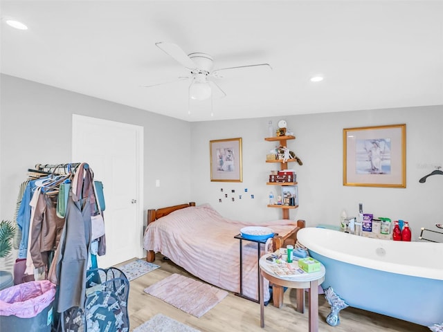 4915 S Rd, New Port Richey, FL 34652 - bedroom featuring wood finished floors, recessed lighting, and a ceiling fan