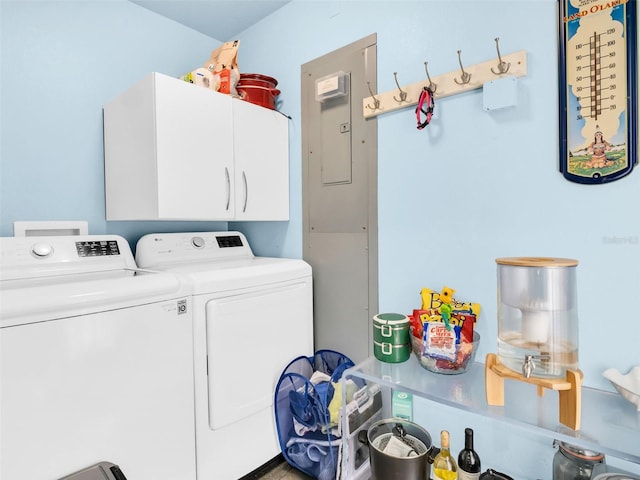 4915 S Rd, New Port Richey, FL 34652 - washroom featuring cabinet space and washing machine and clothes dryer