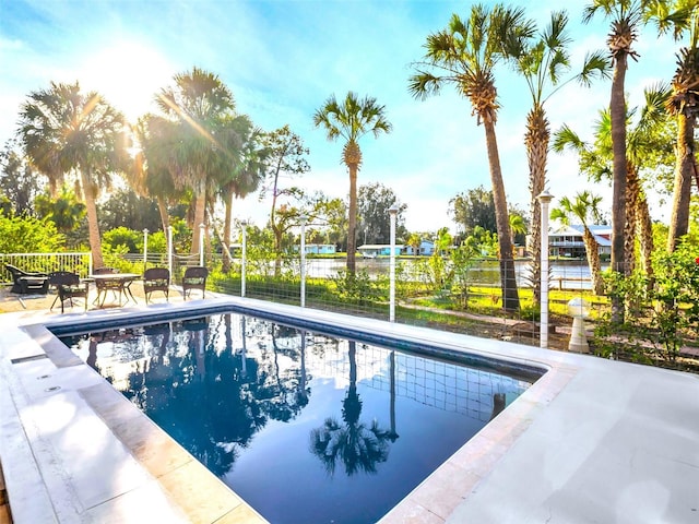 4915 S Rd, New Port Richey, FL 34652 - view of swimming pool featuring a fenced backyard and a patio