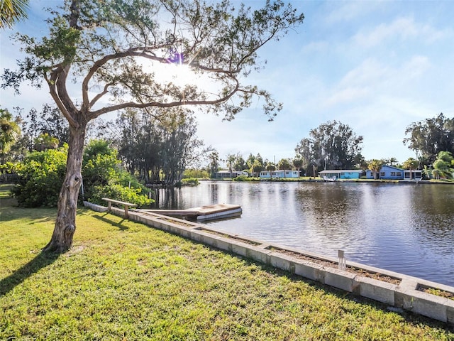 4915 S Rd, New Port Richey, FL 34652 - dock featuring a water view and a yard