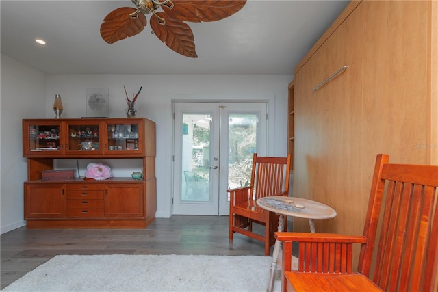 33 Cypress Dr, Palm Harbor, FL 34684 - living area featuring french doors, a ceiling fan, and wood finished floors